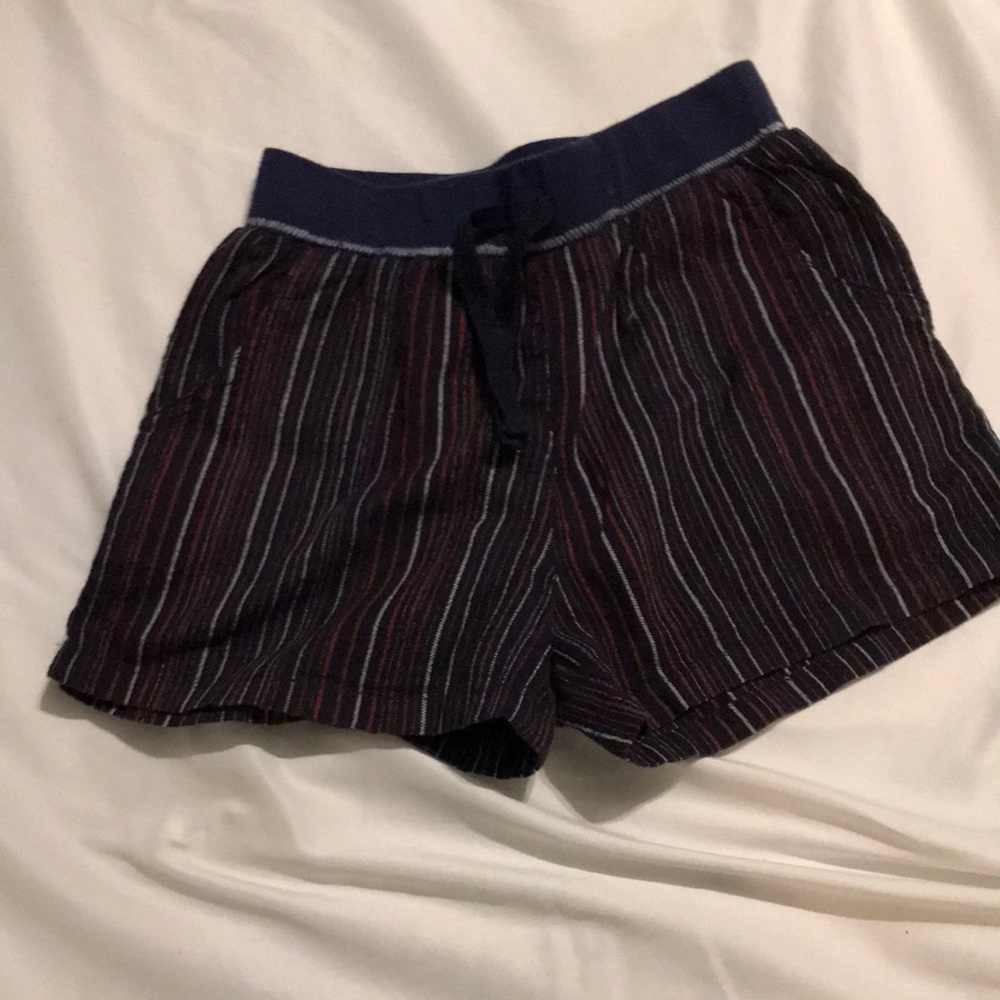 Girls Spledid shorts, navy with red and white thin stripes.